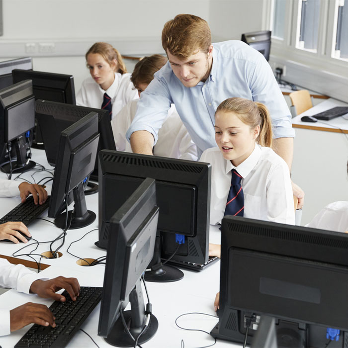 A teacher guiding a student through a lesson