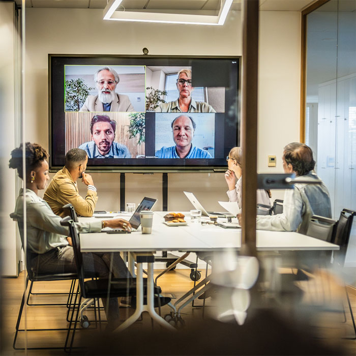A group of people having a Teams meeting