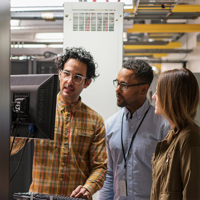 Engineers working in the data center area